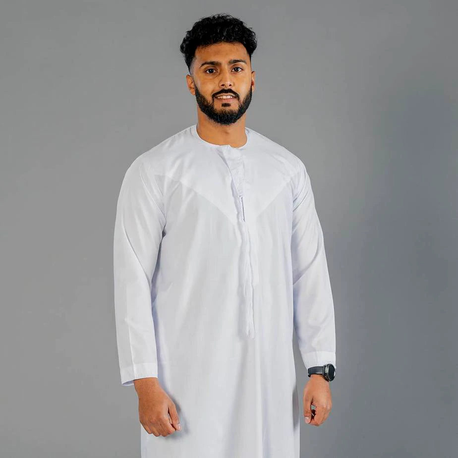 A grey Emirati style thobe is versatile so you can design it in